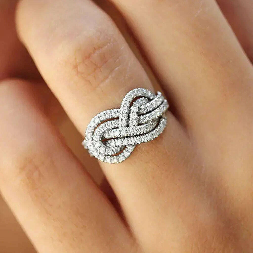 Huitan 2023 New Woman Ring Twist Infinite Shape Crystal Cubic Zirconia Rings Exquisite Female Wedding Bands Fashion Jewelry Bulk - KIMLUD